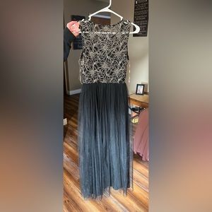 Beautiful dress great for formal dress or prom. Size small